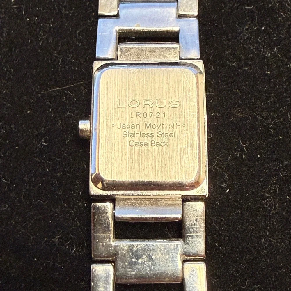 Lorus Womens Watch Silver Tone Rectangle Case Red Textured Dial Japan Movt Works